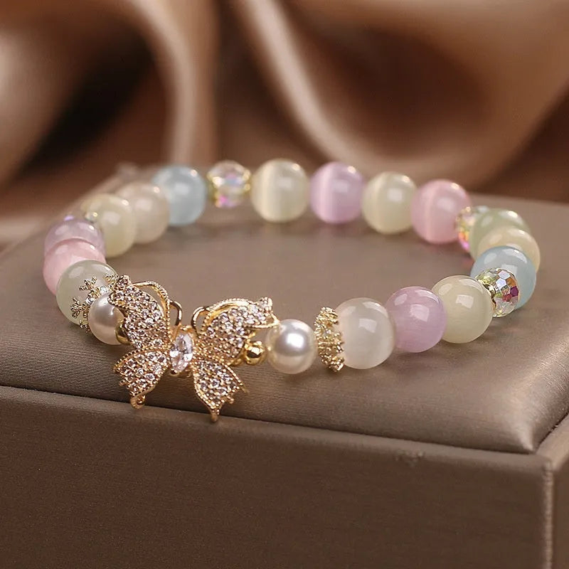 Natural stone bracelet with golden moonstone and butterfly design for women