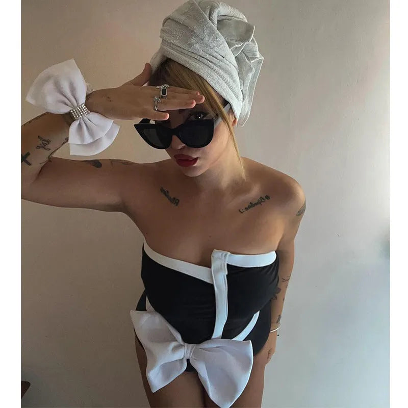 Women's black and white colour-block one-piece swimsuit with bow detail and tube top