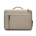 Khaki nylon laptop sleeve with zip closure and visible sewing lines next to a 14-inch notebook