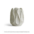 Irregular shaped art ceramic vase for flower arrangements in low and high style options.
