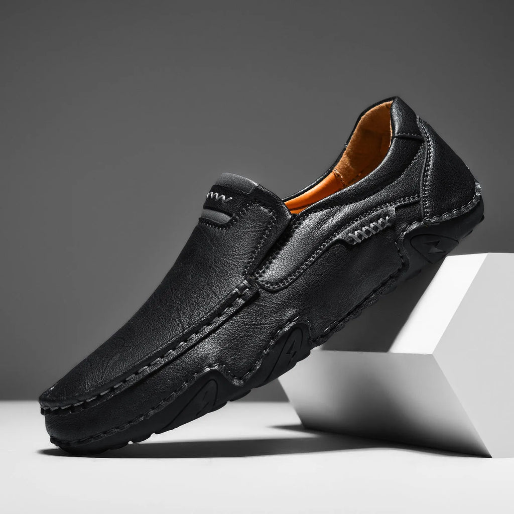 Men's leather slip-on casual shoes with round toe and flat rubber sole in four colour options