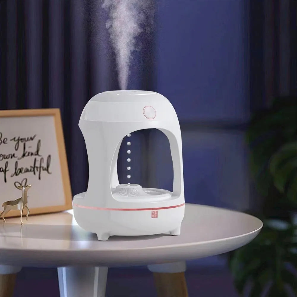 Levitation humidifier with floating water drops and LED night light in columnar design