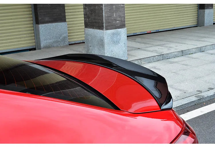Bright black Mazda 3 Axela Exela sports tail blade trim for 2014-2021 models