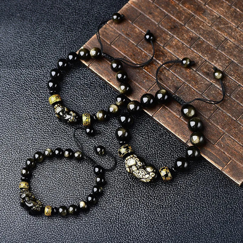 Hand-woven golden obsidian bracelet with Pi Xiu charm in 8mm, 10mm, 12mm, and 14mm bead sizes.