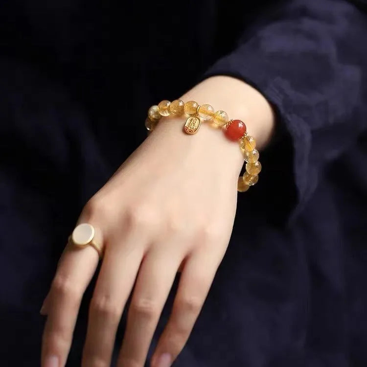 Natural red agate bead bracelet with a gold-plated clasp, showing 6mm, 8mm, and 10mm size options.
