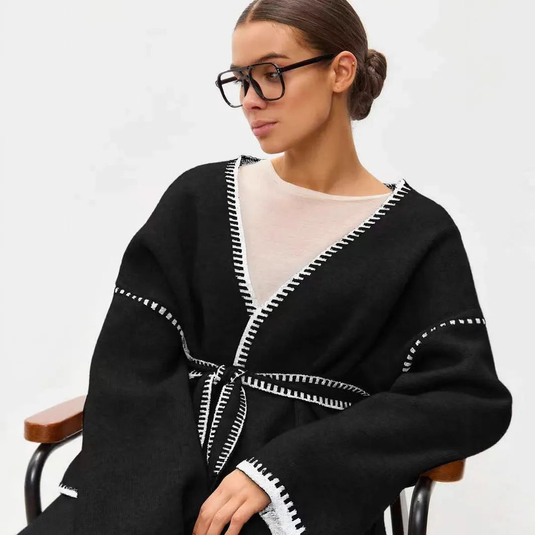 White lace-up knitted cardigan sweater coat with long sleeves and mid-length design