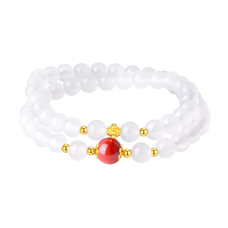 White agate double layer bracelet with jequirity bean cinnabar charm in geometric design