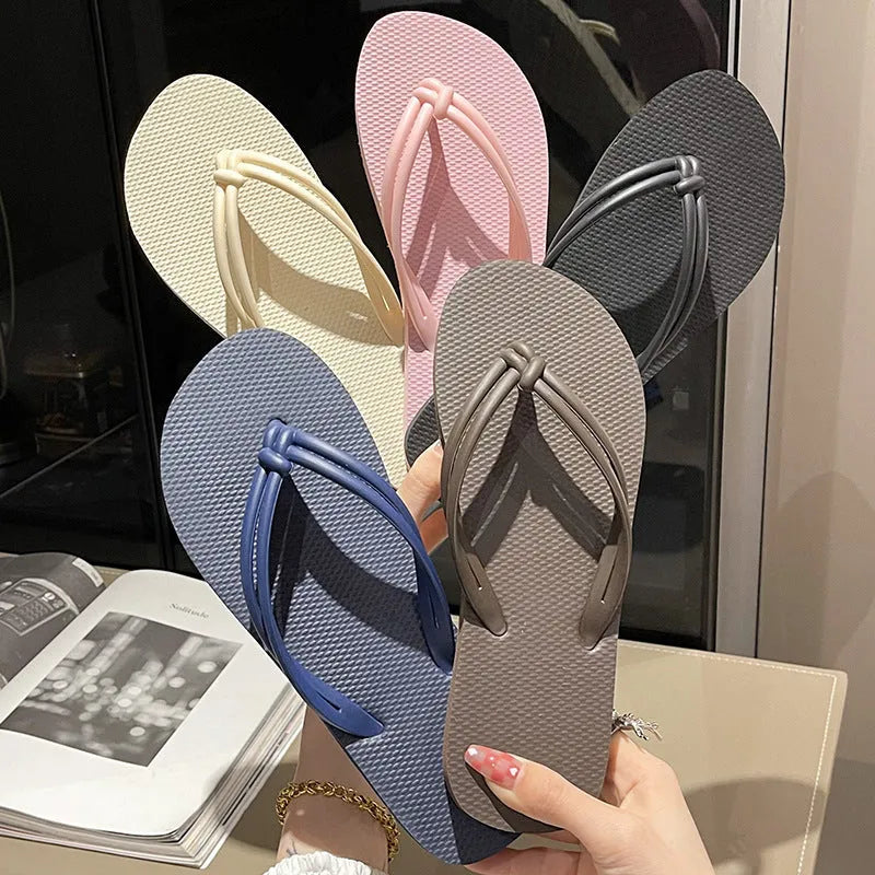 Men's PVC flip flops in beige with a non-slip sole and toe-covering style.