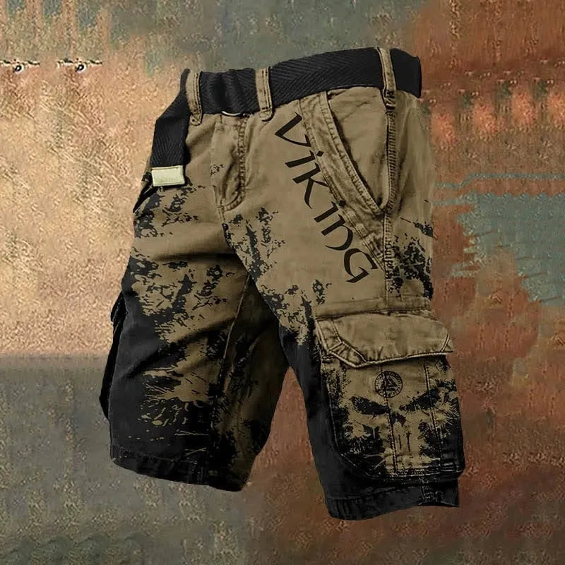 Man wearing black 3D digitally printed polyester shorts with a graphic pattern and zipper closure.
