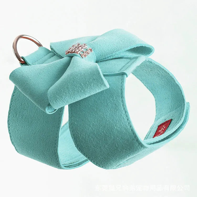 Cute fashion bowknot puppy chest strap in microfiber, shown in pink, blue, and orange colours.