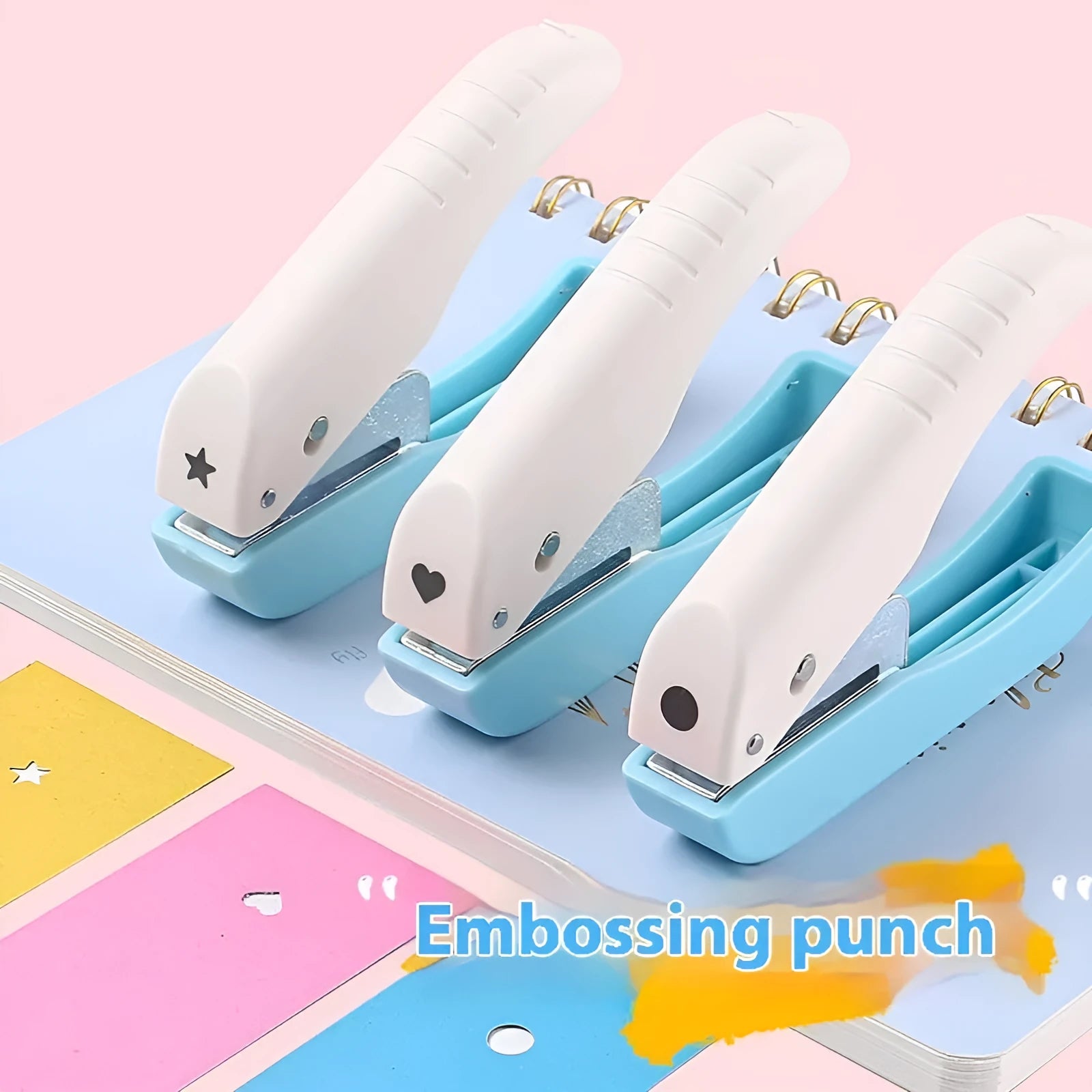 Manual kindergarten pattern punching machine with round, star, and heart-shaped cutters.