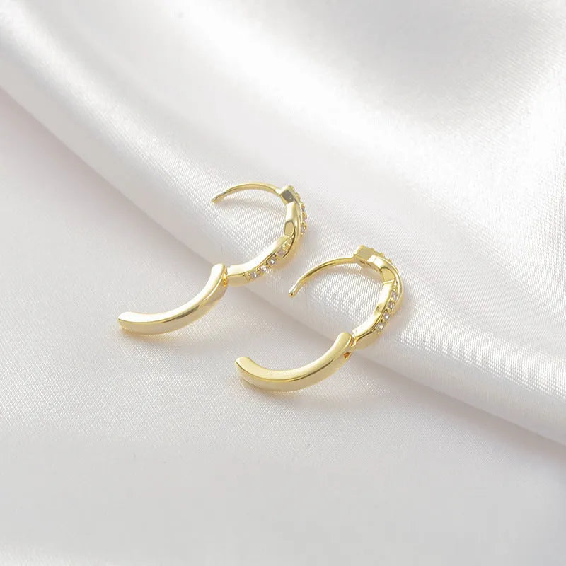 Geometric hemp rope interwoven earclip earrings in gold colour with diamond treatment surface