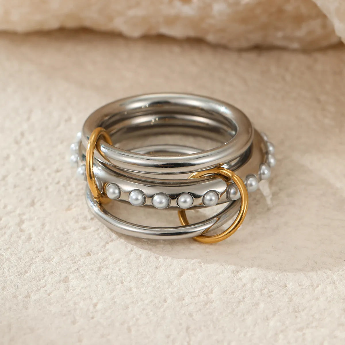 Stacked colour matching stainless steel ring with 18K gold plating and exaggerated personalised design
