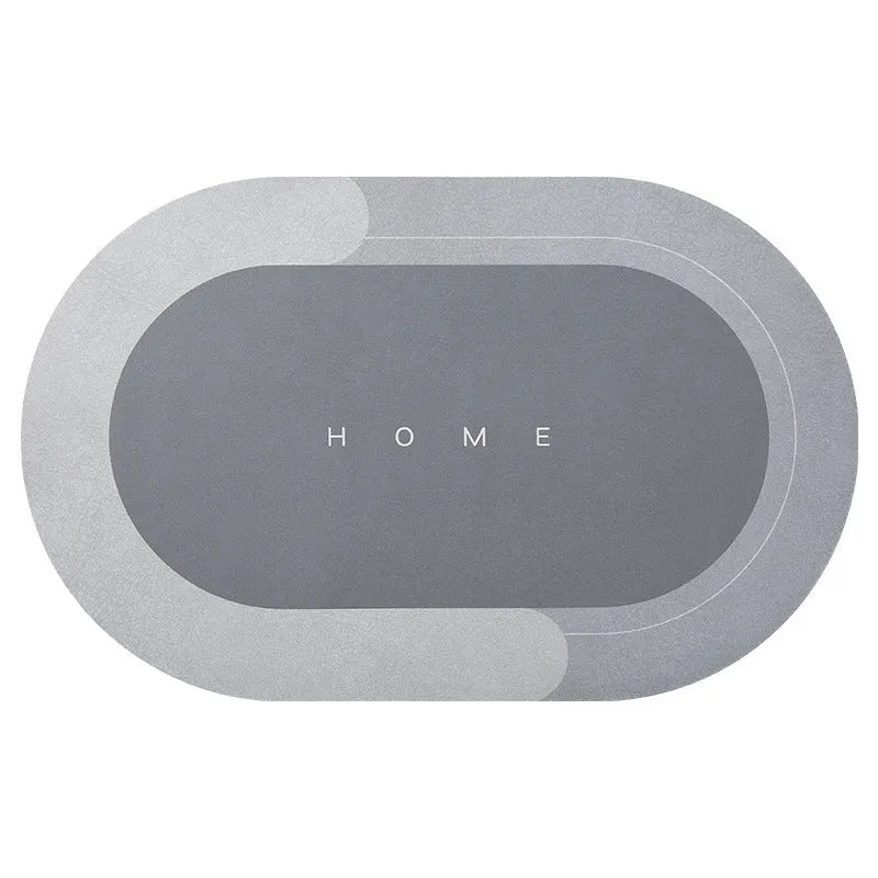 Oval natural rubber bathroom floor mat in blue on tiled floor