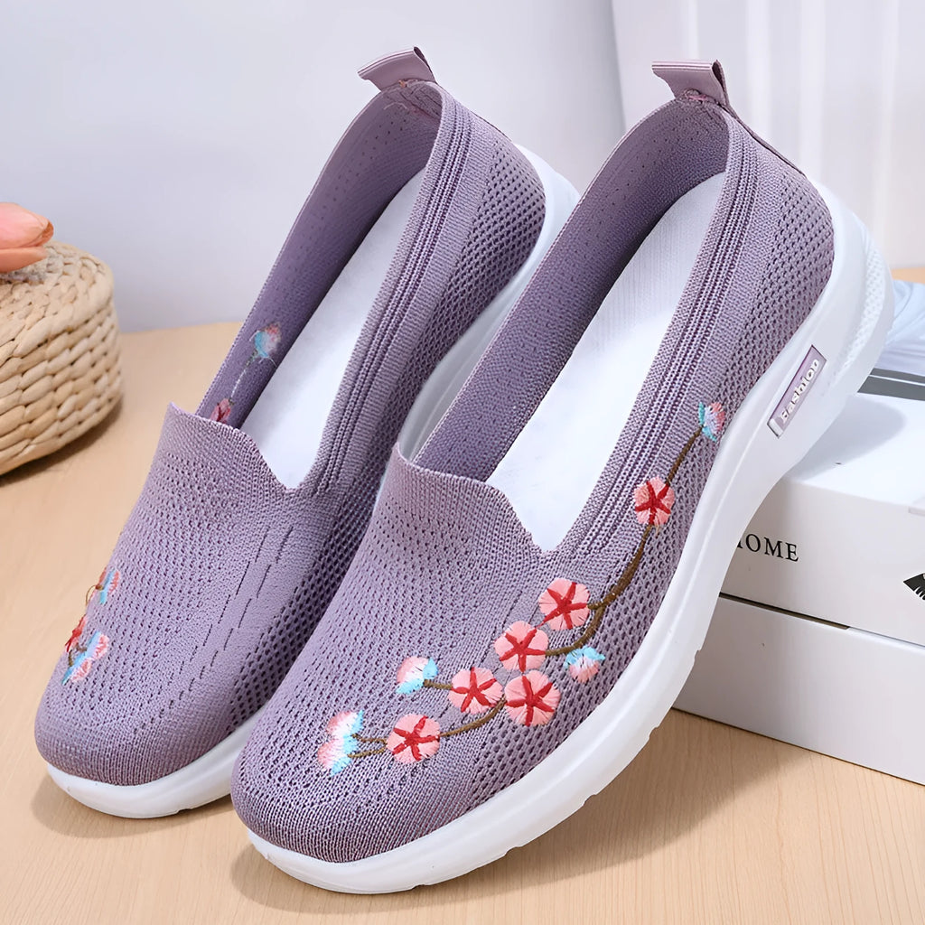 Women's wine red woven casual pumps with floral embroidery and a low anti-slip sole.