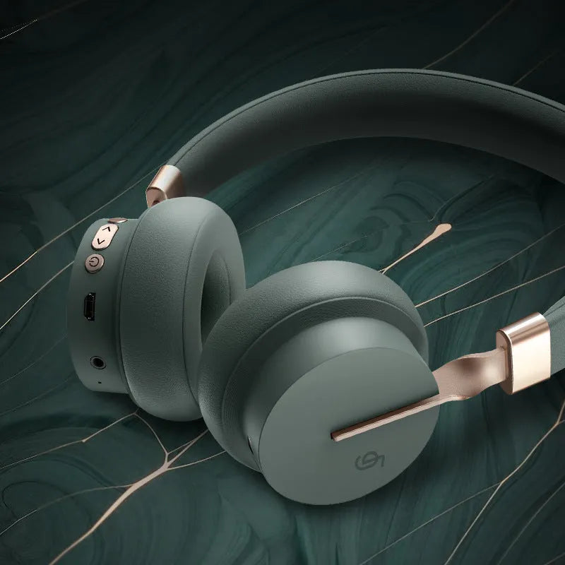 Solid colour Bluetooth headset for hands-free calling and music in green, black, red, blue, or white.