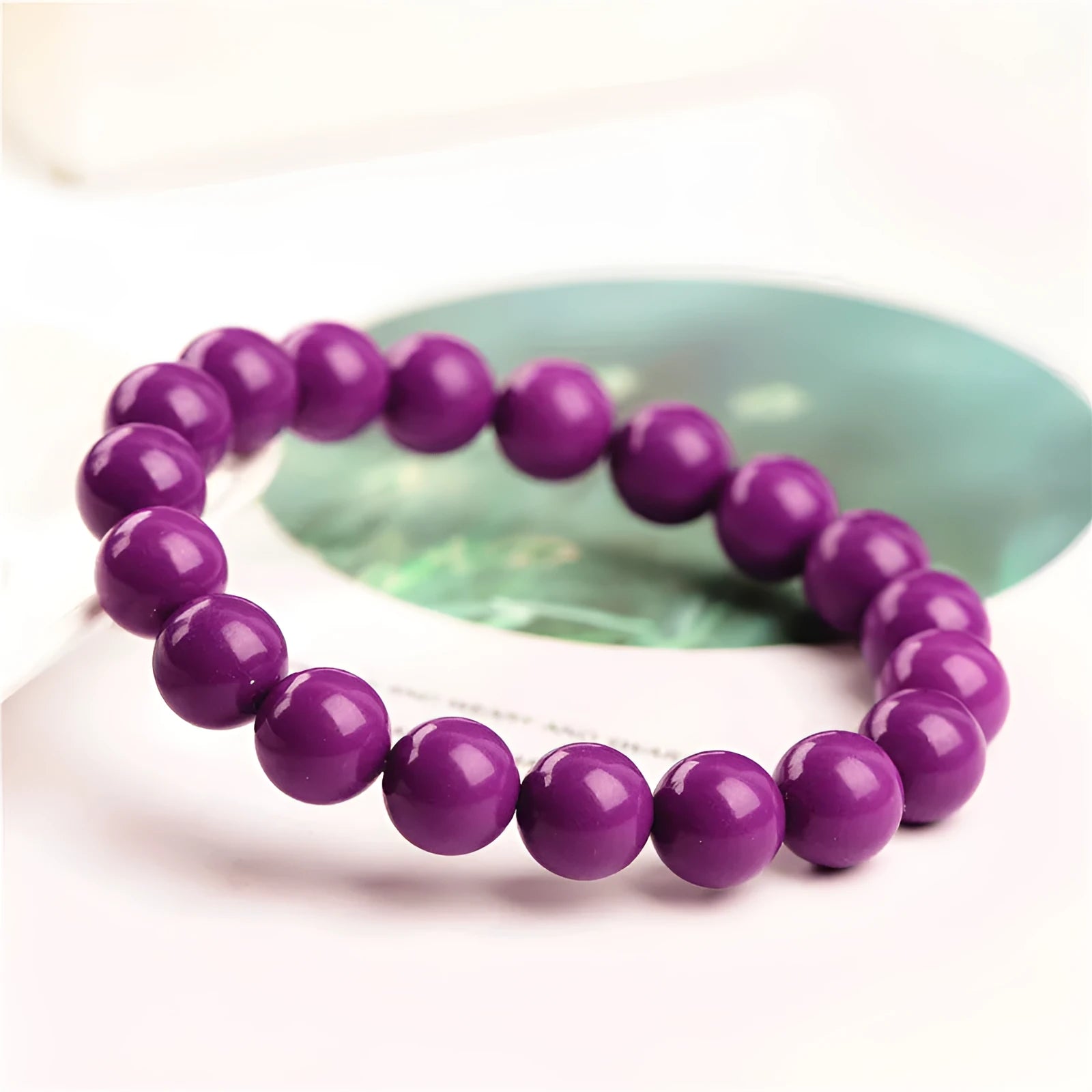 Jiuya purple mica crystal bracelet with polished beads in an original unisex design.