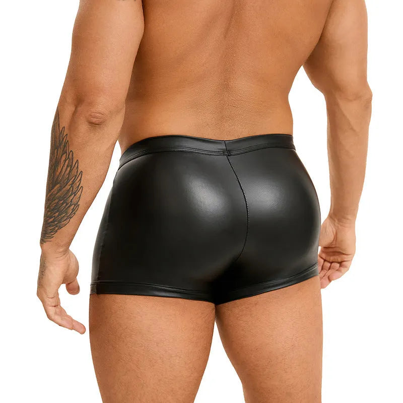 Black men's PU leather shorts with U-pouch design on a size chart showing M to 3XL