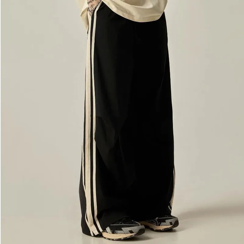 Black wide leg climbing trousers for men with high waist and straight leg cut