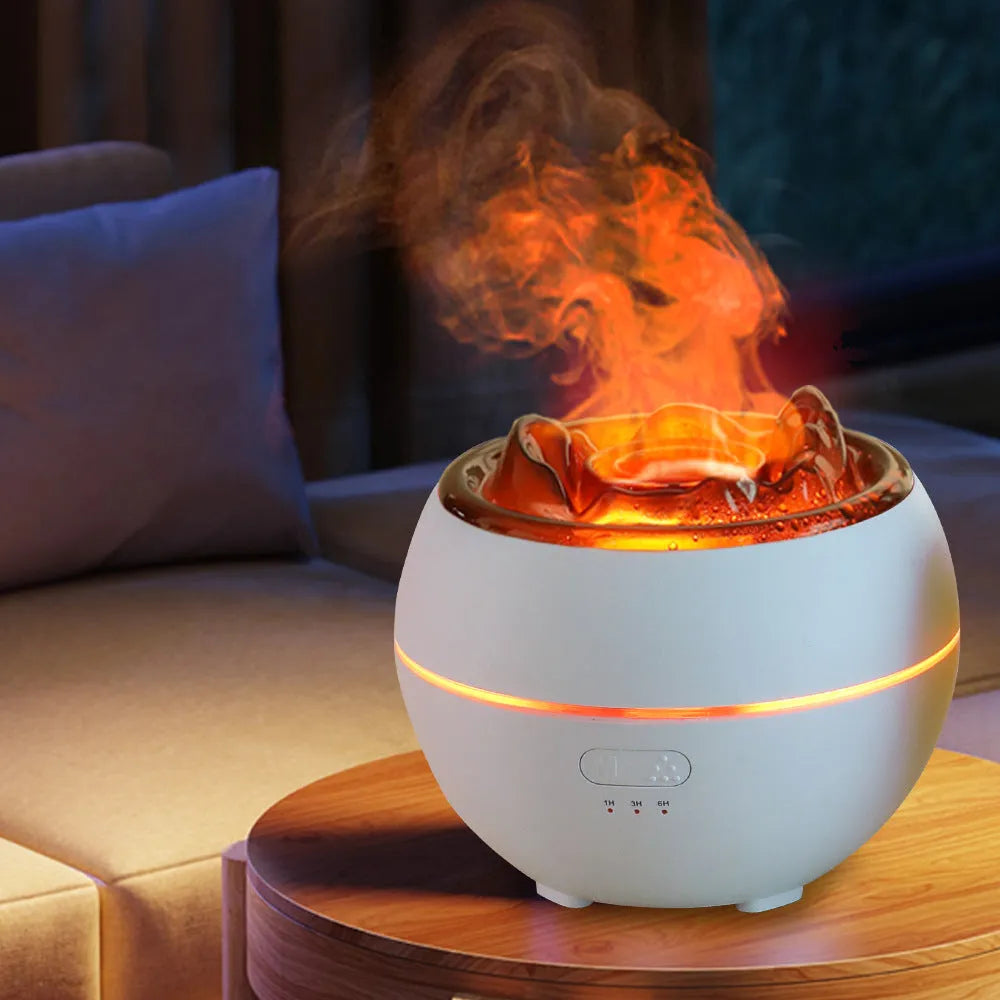 White round desktop flame aroma diffuser and humidifier with USB plug on a wooden table.