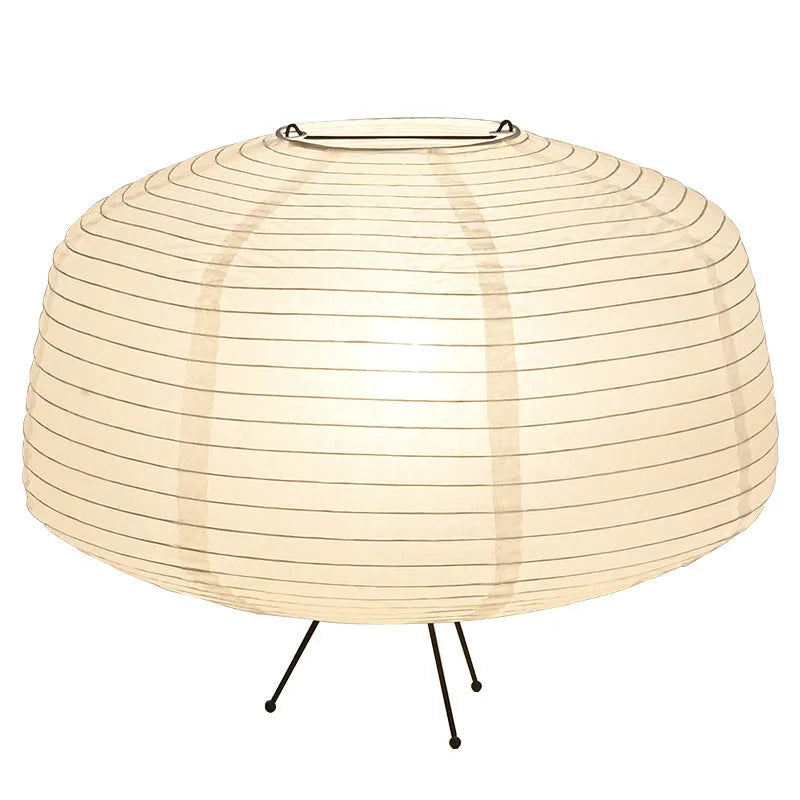 Japanese style xuan paper desk lamp with three-colour light source on a wooden desk in a bedroom