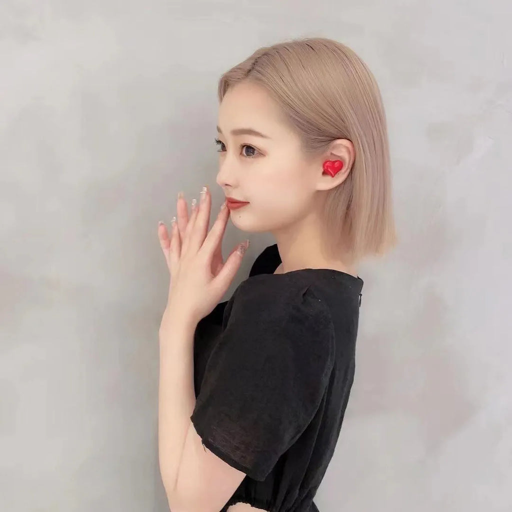 Heart-shaped wireless Bluetooth headphones in Chinese red or girl pink colours with in-ear design