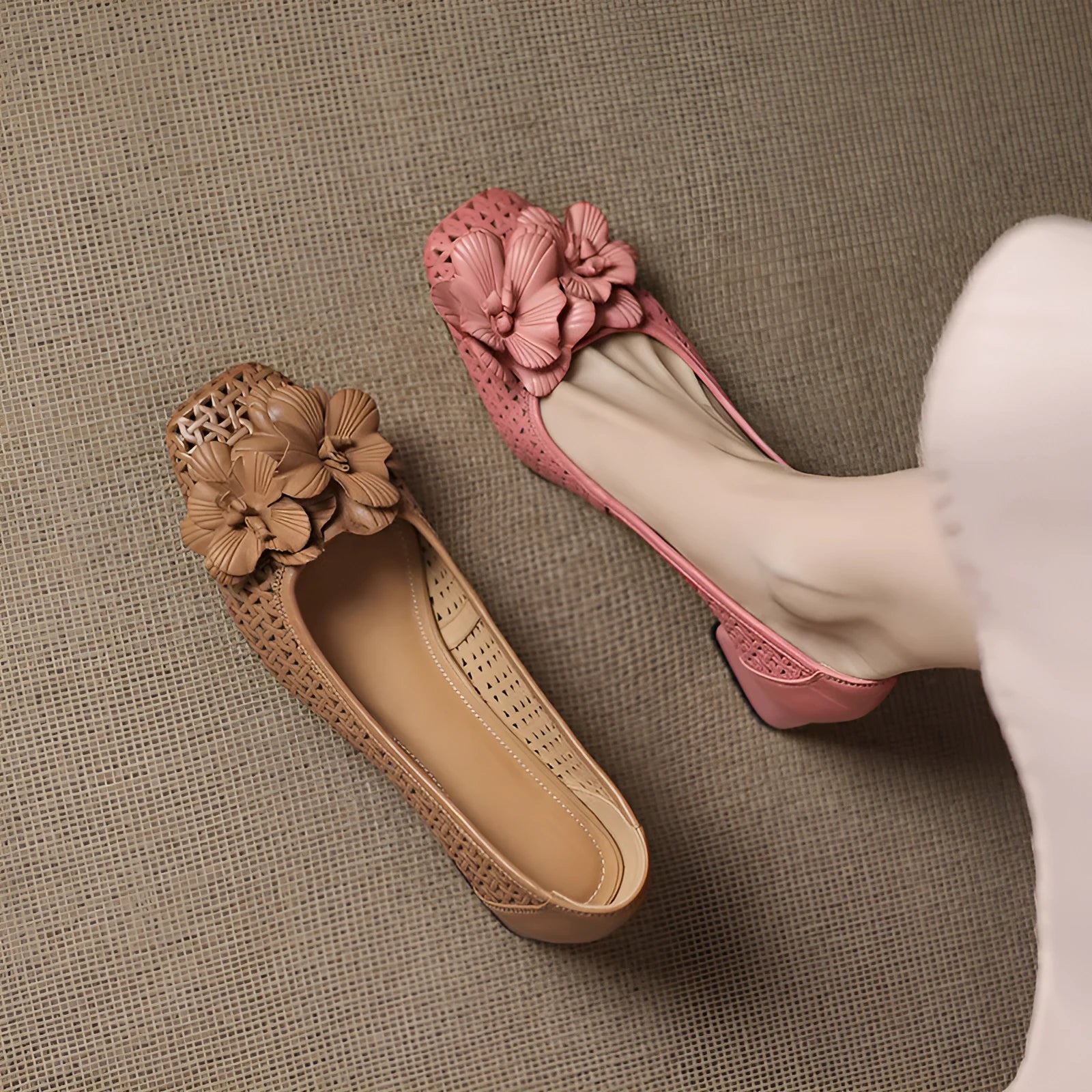 Light brown women's leather pumps with a hollow weave design and a mid-height heel.