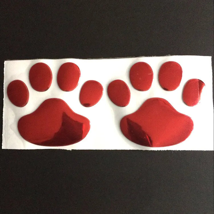 PVC car sticker with hand-shaped brush design showing dog footprint pattern in choice of colours