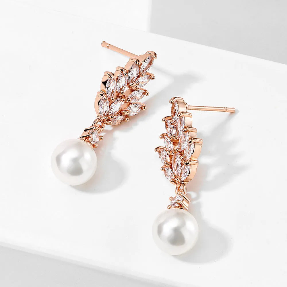 Geometric floral design earrings with micro inlaid zircon, available in white gold, rose gold, and platinum plating.
