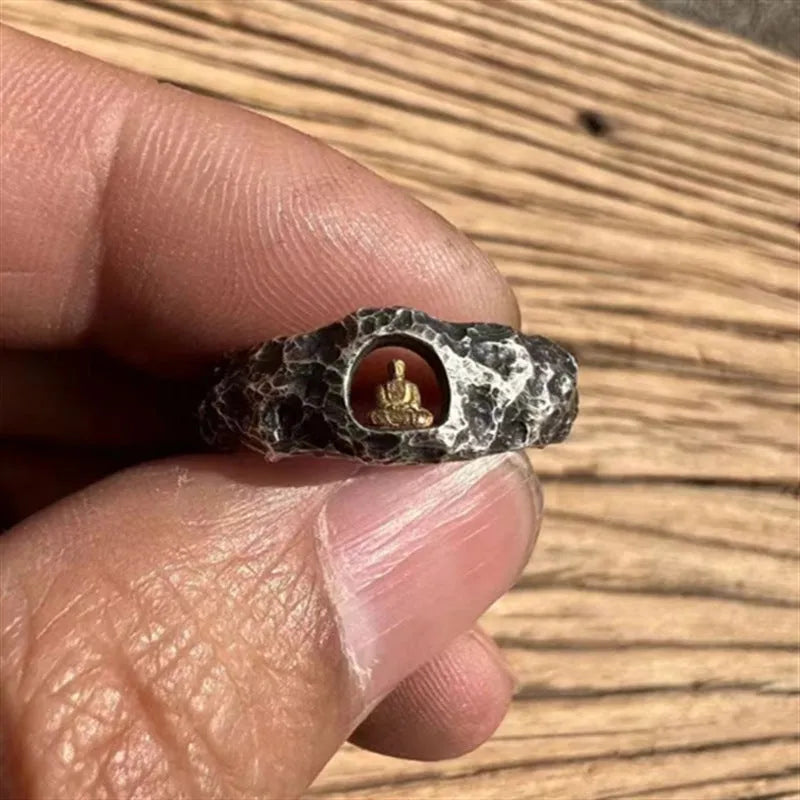 Hand-forged copper ring with a grotto Buddha design and textured rock finish, shown in size 8.