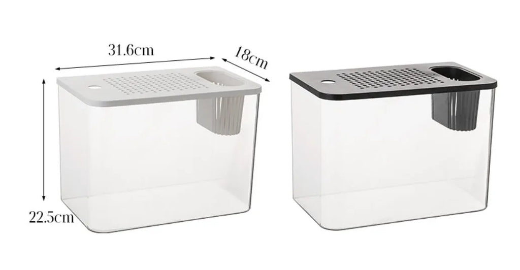 A black rectangular plastic fish tank with a clear plastic cover, sitting on a table.