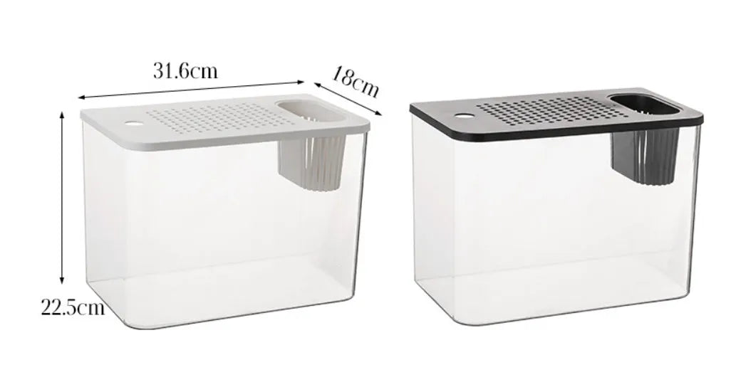 A black rectangular plastic fish tank with a clear plastic cover, sitting on a table.