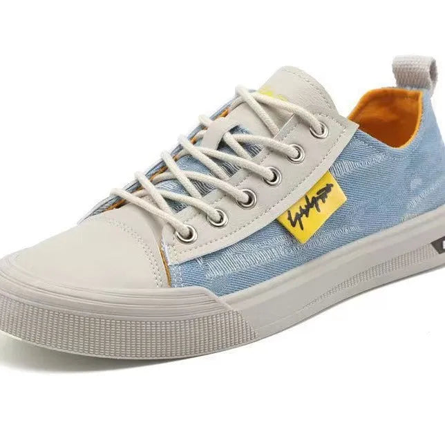 Men's dark blue canvas lace-up shoes with a round toe and white rubber sole on a neutral background.