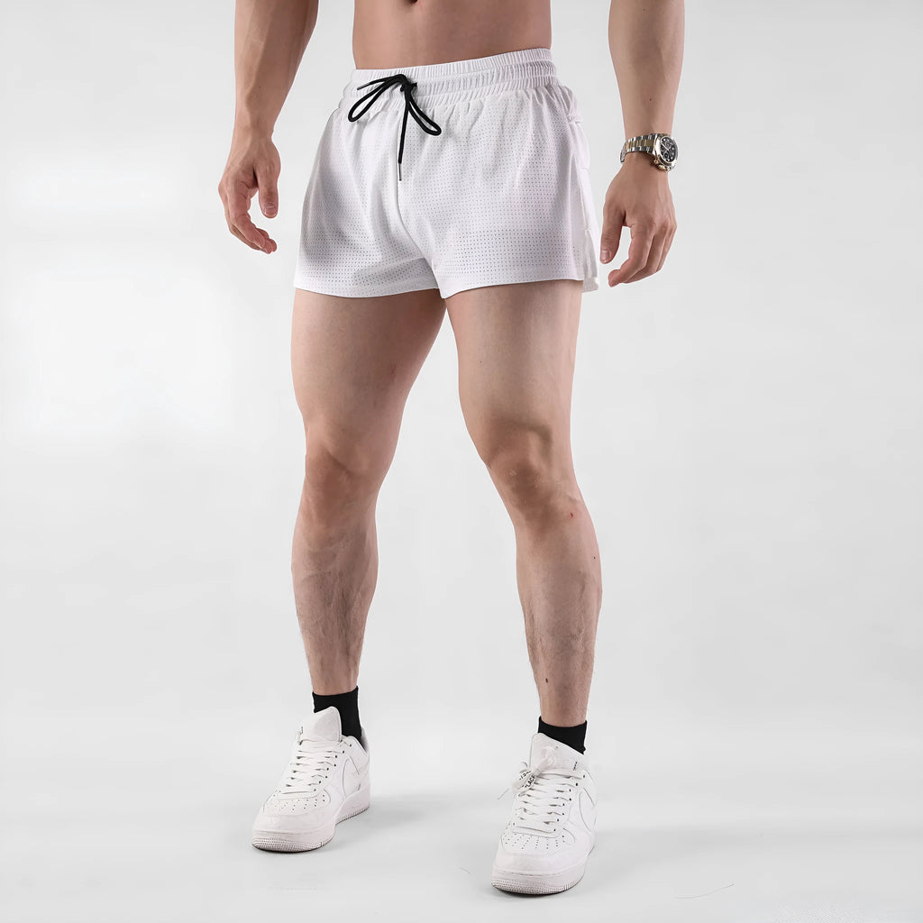 Men's black quick-drying nylon sports shorts on a summer background