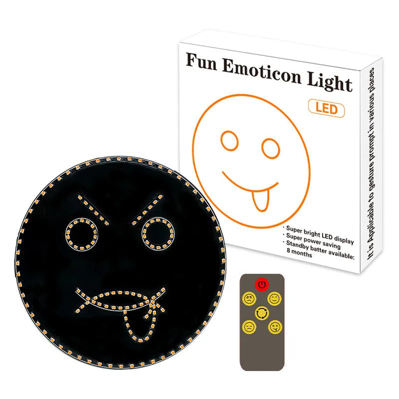 Black car rear window LED expression light showing orange smiley face design with remote control
