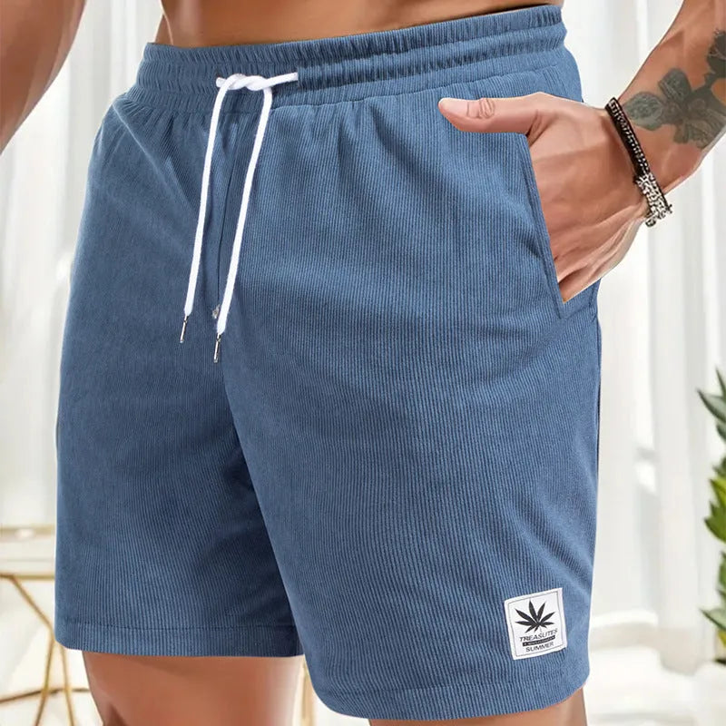 Men's black drawstring summer shorts with straight leg on a mannequin