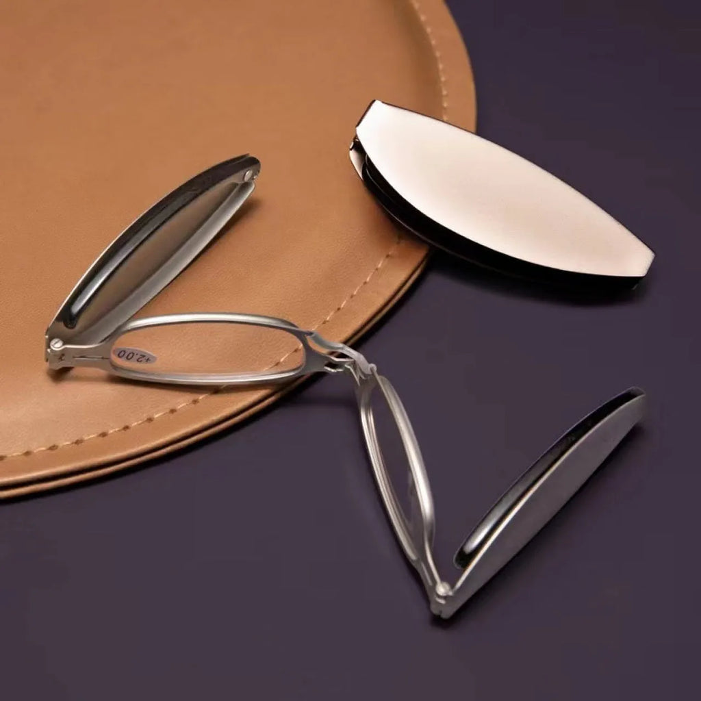 Folding presbyopic glasses in black retro frame showing folded and unfolded positions