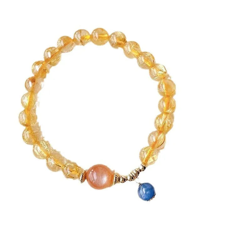Gold rutilated quartz sunstone crystal bracelet with round diamond-shaped beads