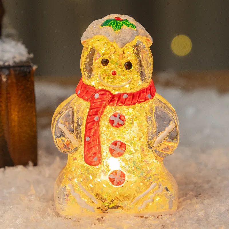 Glowing plastic gingerbread snowman Christmas ornament with a red scarf