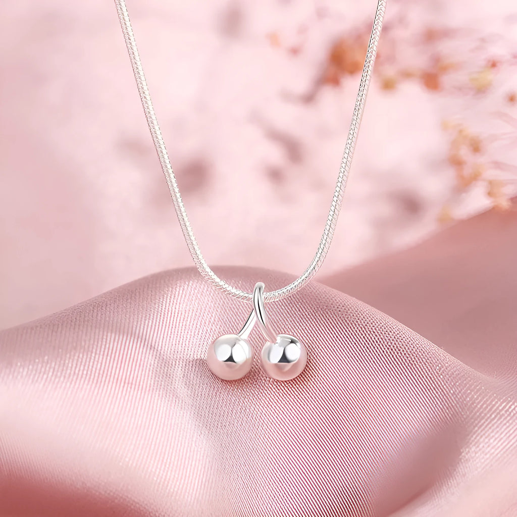 Silver cherry necklace on snake bone chain, adjustable length, Korean style jewellery for women.