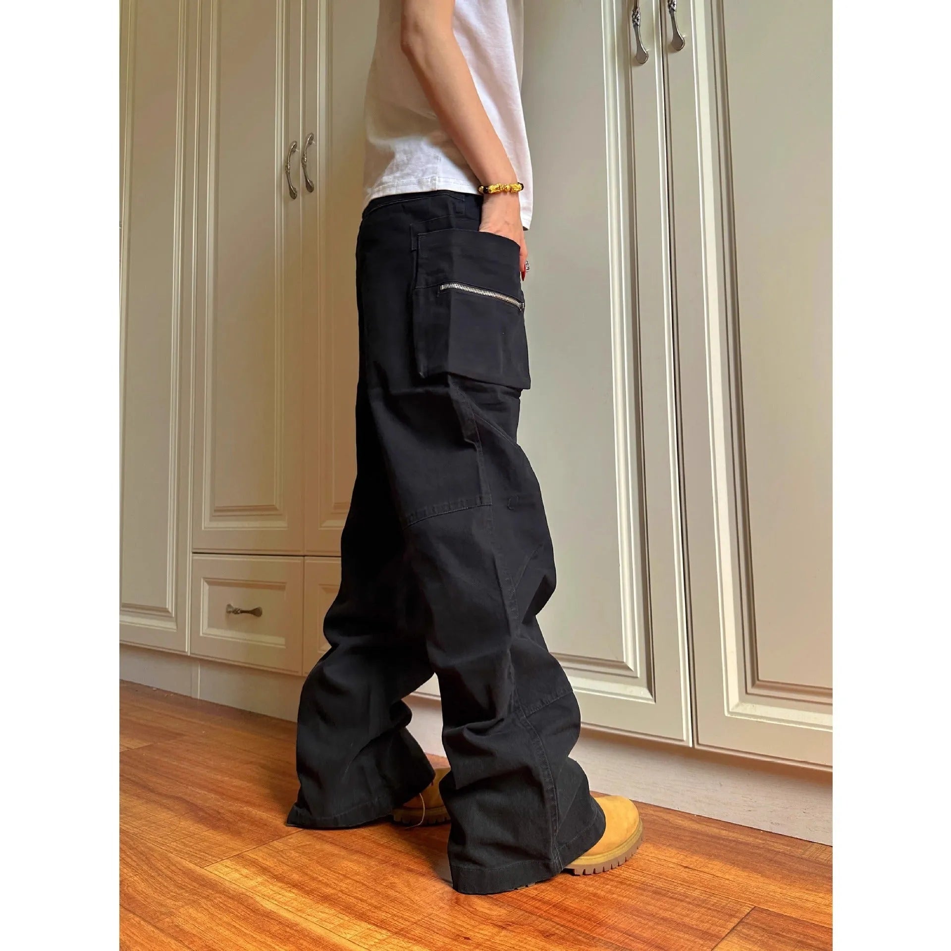Green and black cotton casual workwear pants with double zipper front closure and multiple pockets