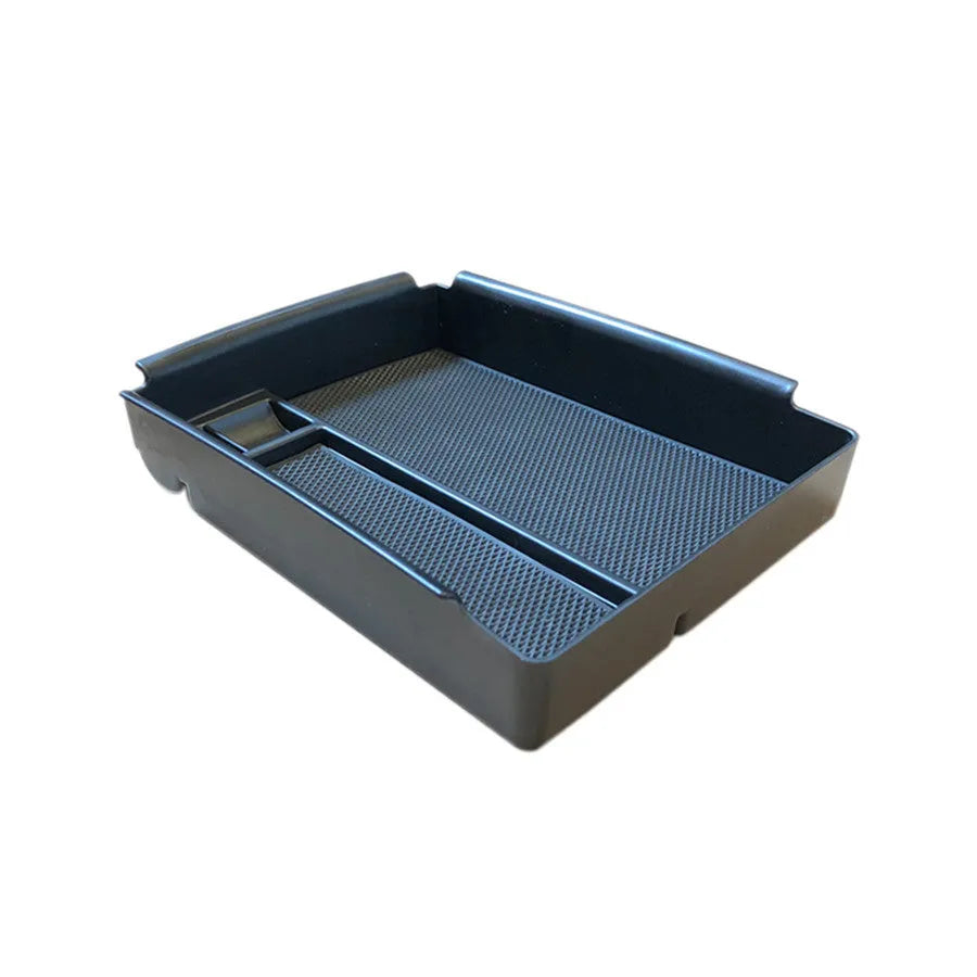 Black ABS plastic QI wireless charging dock and storage box with USB-C port.