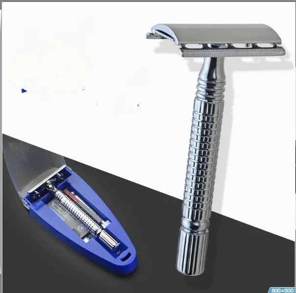 Chrome double edged safety razor with butterfly opening mechanism on a storage box