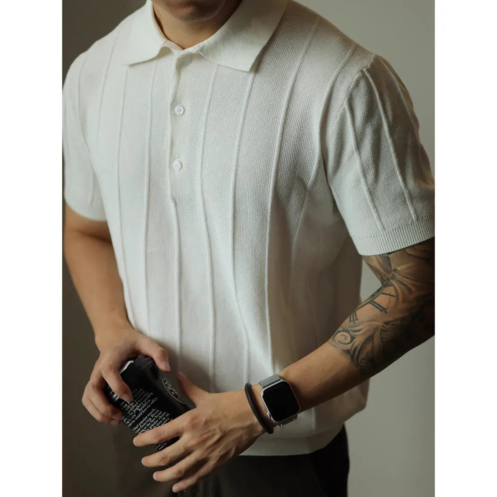 Men's solid black loose fit t-shirt on a hanger