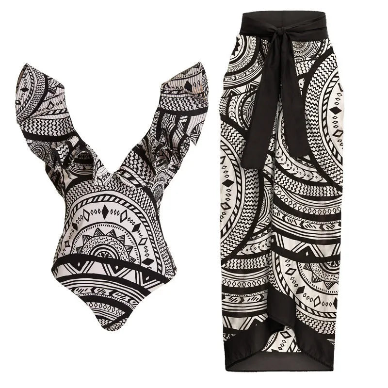 Women's deep V-neck one-piece swimsuit with vintage floral print and matching black wrap skirt.