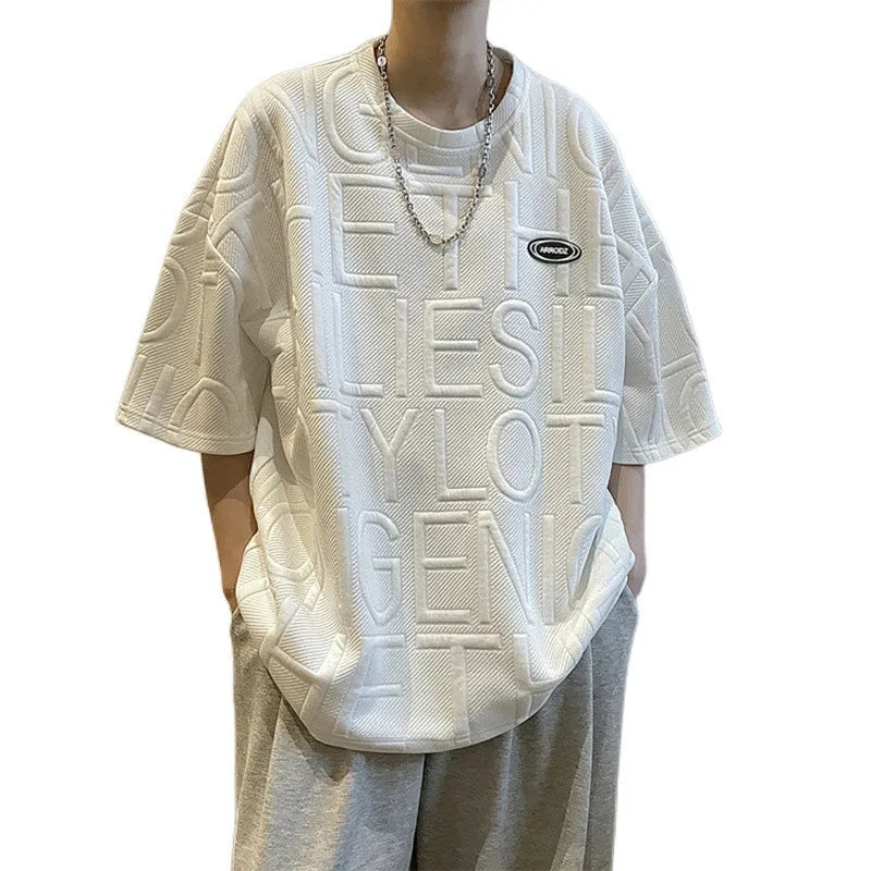 Men's grey short sleeve t-shirt with a raised 3D letter print in a retro loose fit