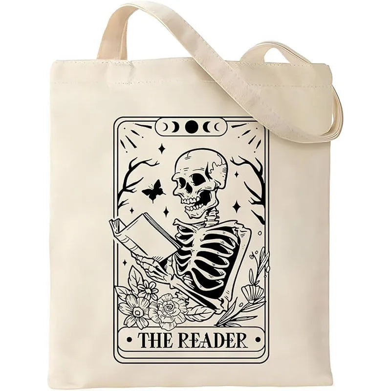 White canvas hand shopping bag with Halloween digital print, 34 by 42 centimetres, on plain background