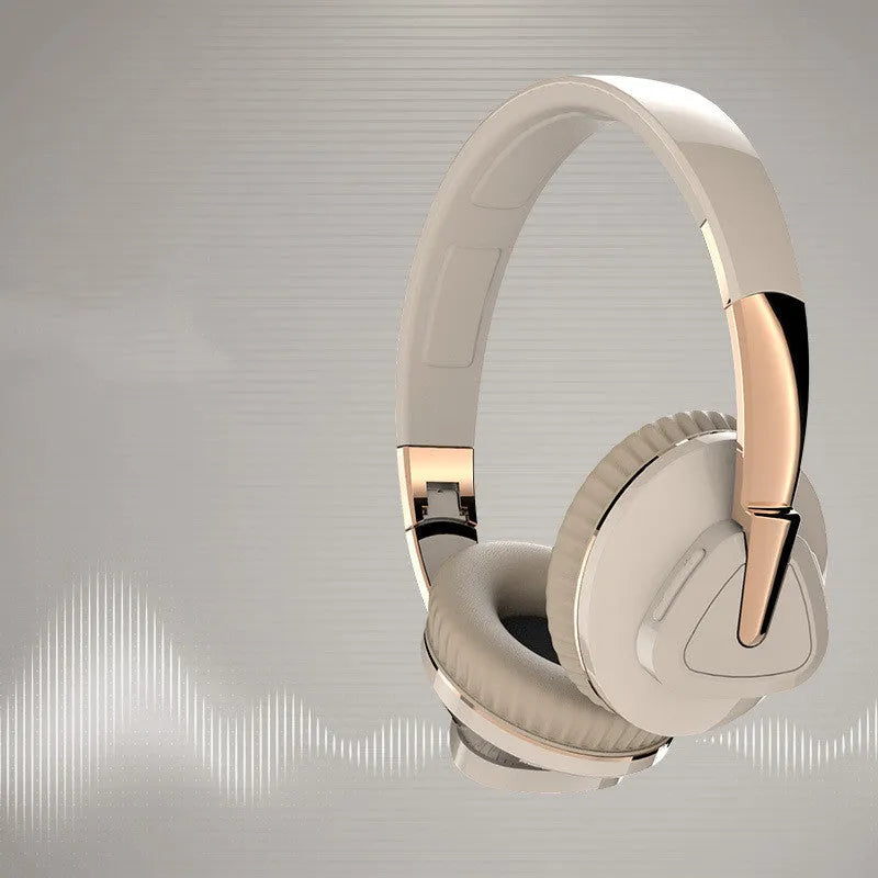 Wireless Bluetooth over-ear headphones in black colour with all-inclusive ear design showing AUX port and control buttons