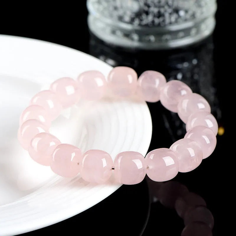 Natural bamboo style crystal barrel bead bracelet in pink with 11-12mm geometric beads