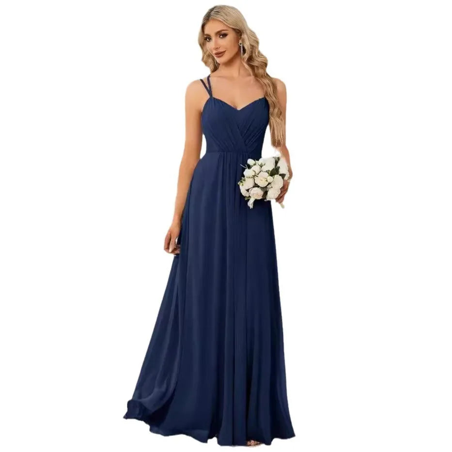 Women's sleeveless long pleated dress in an A-line silhouette, shown in a solid colour.